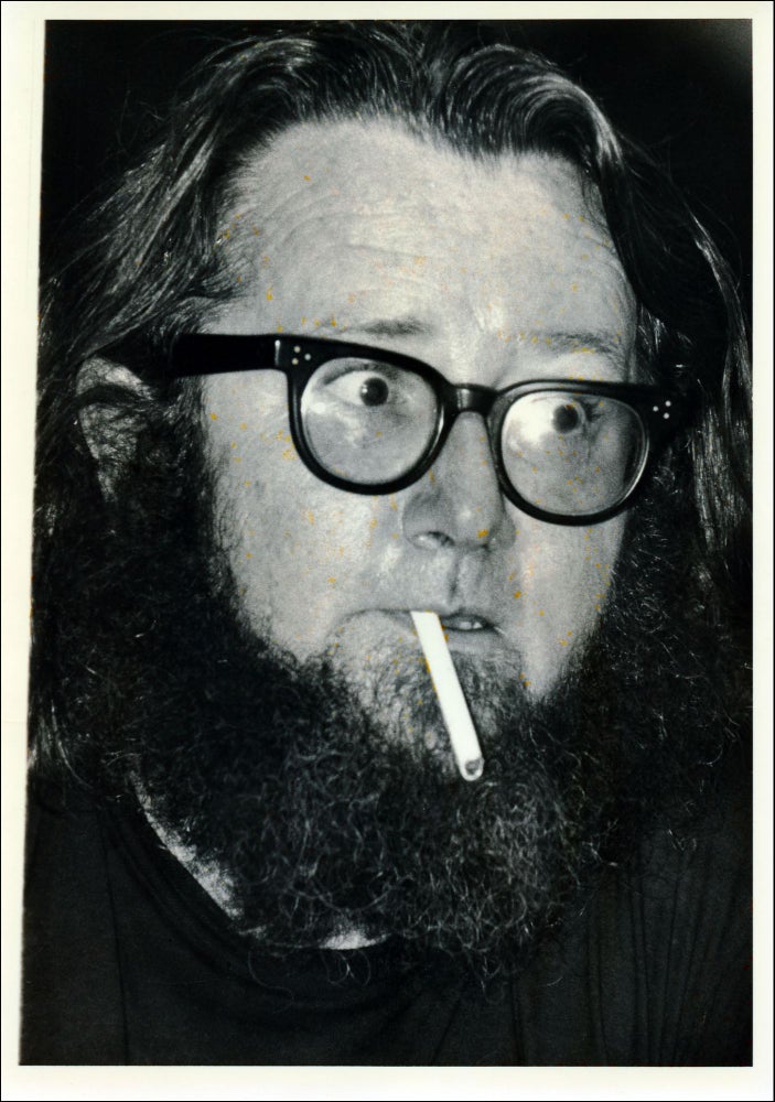 [Photograph of Ted Berrigan with a cigarette]. Ted Berrigan, Louis R. Cartwright. N.p. n.d.